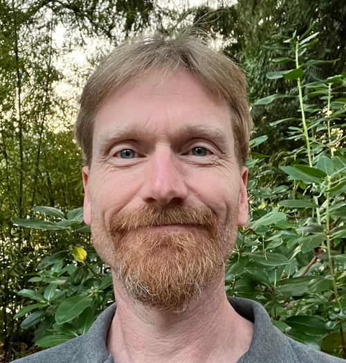 Man with beard smiling
