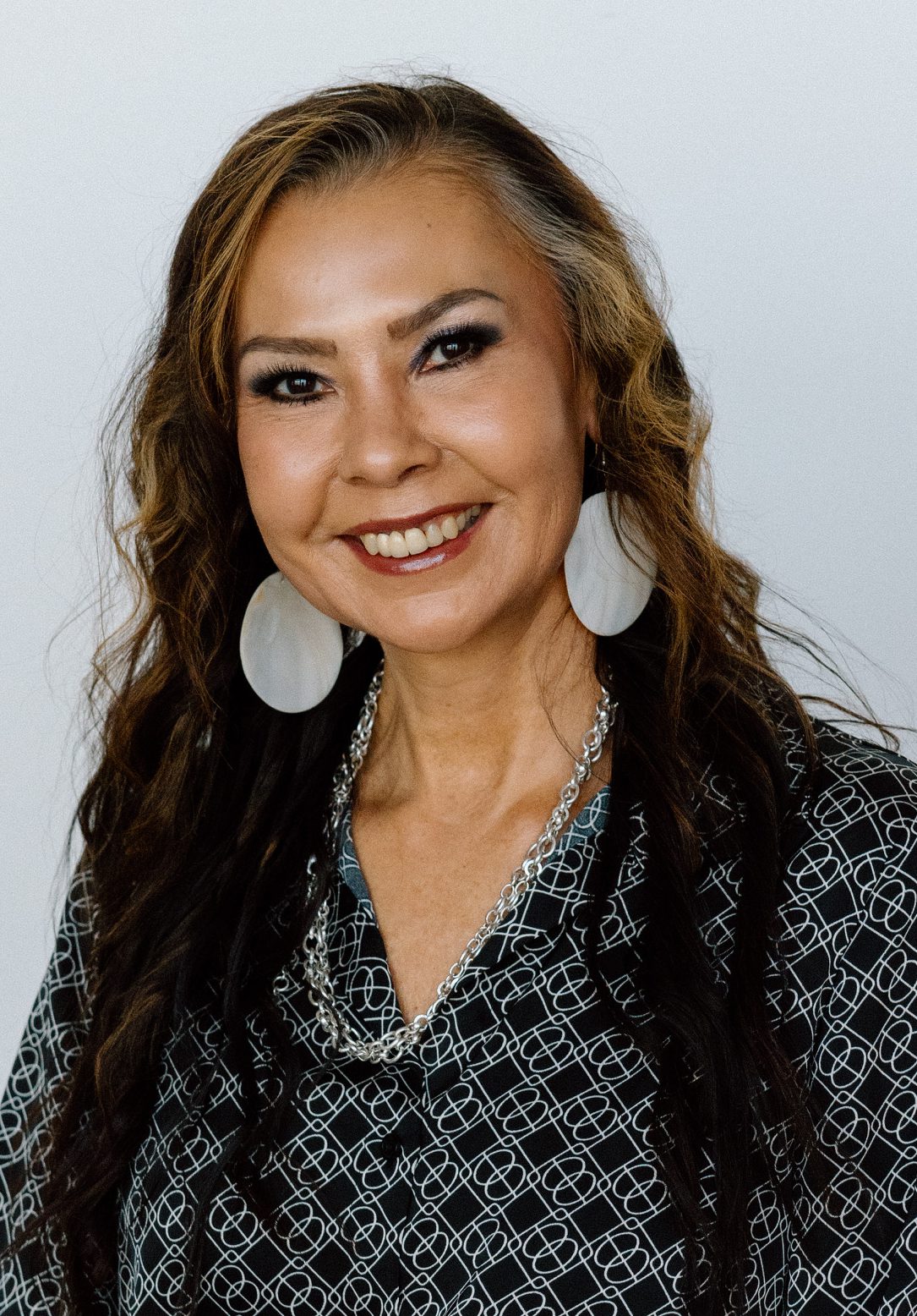 A woman with smiling at camera