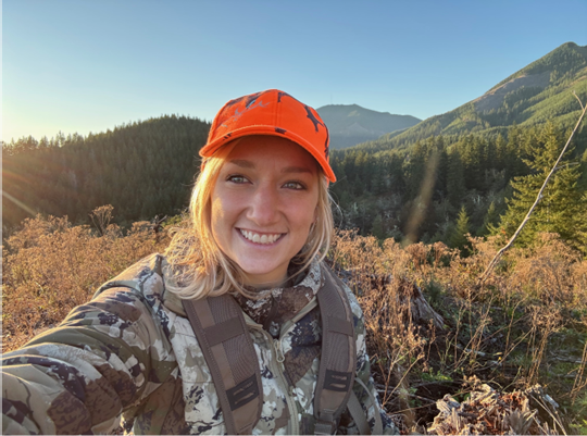 Blond girl with orange hat