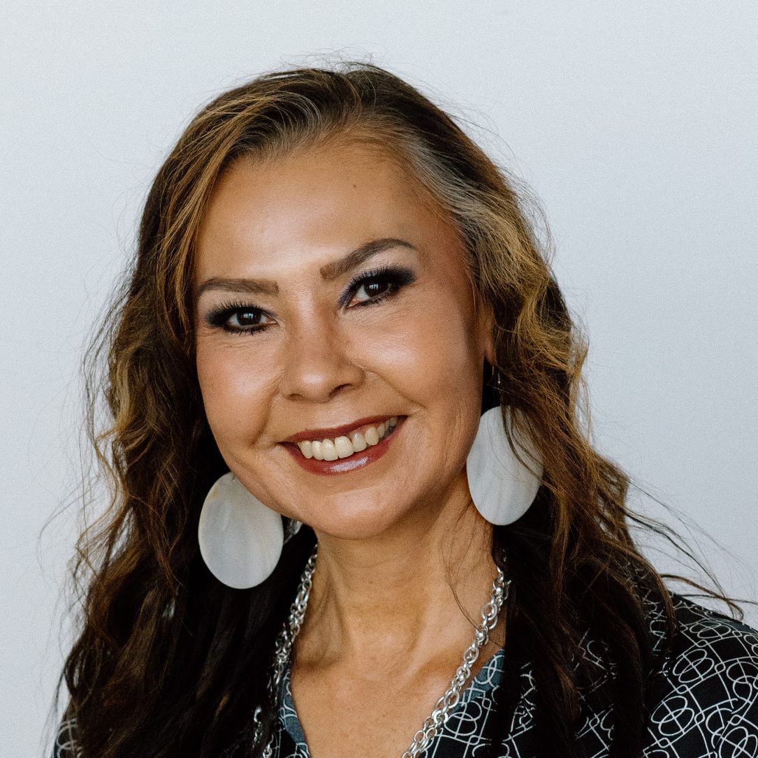 A woman with smiling at camera